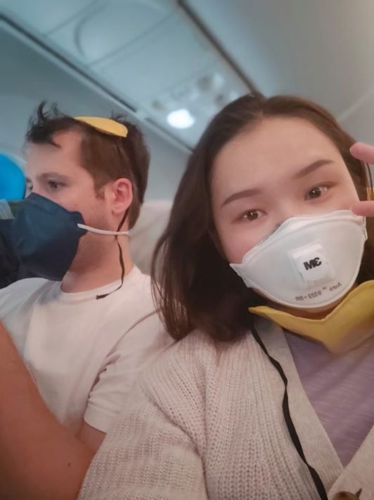 Chegando de avião em Beijing em temos de Coronavírus