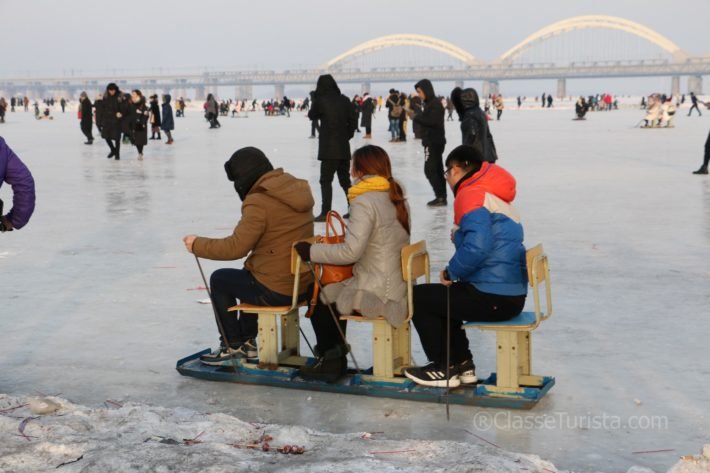 Playing on Songhua River in winter, Harbin, China