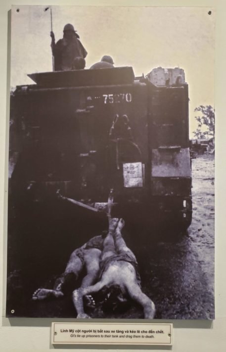 GI's tied up prisoners to their tank and dragged them to death, War Remnants Museum, Ho Chi Minh City